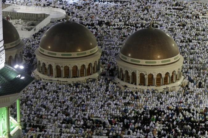Muslim pilgrims pray around the holy Kaaba at the Grand Mosque in Mecca during Hajj pilgrimage