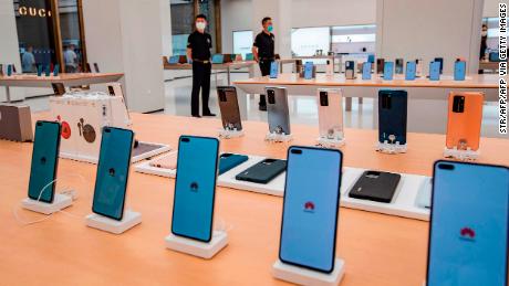 Smartphones are displayed at a Huawei store ahead of its opening in Shanghai this month. 