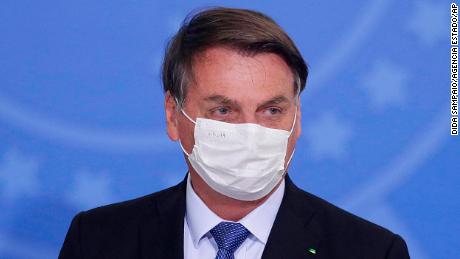 Brazil&#39;s Jair Bolsonaro tests positive for Covid-19 after months of dismissing the seriousness of the virus