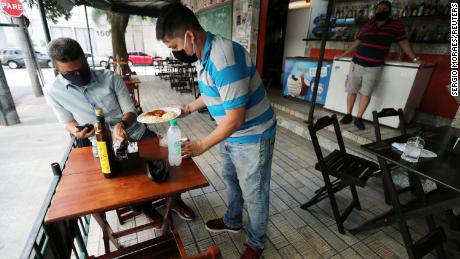 &#39;Sending the population to the slaughterhouse&#39;: Restaurants and bars open in Rio, as experts warn worst is yet to come