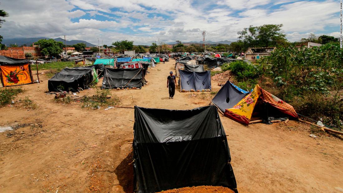 Covid-19 forced Venezuelans to head home. But crossing the border isn't easy