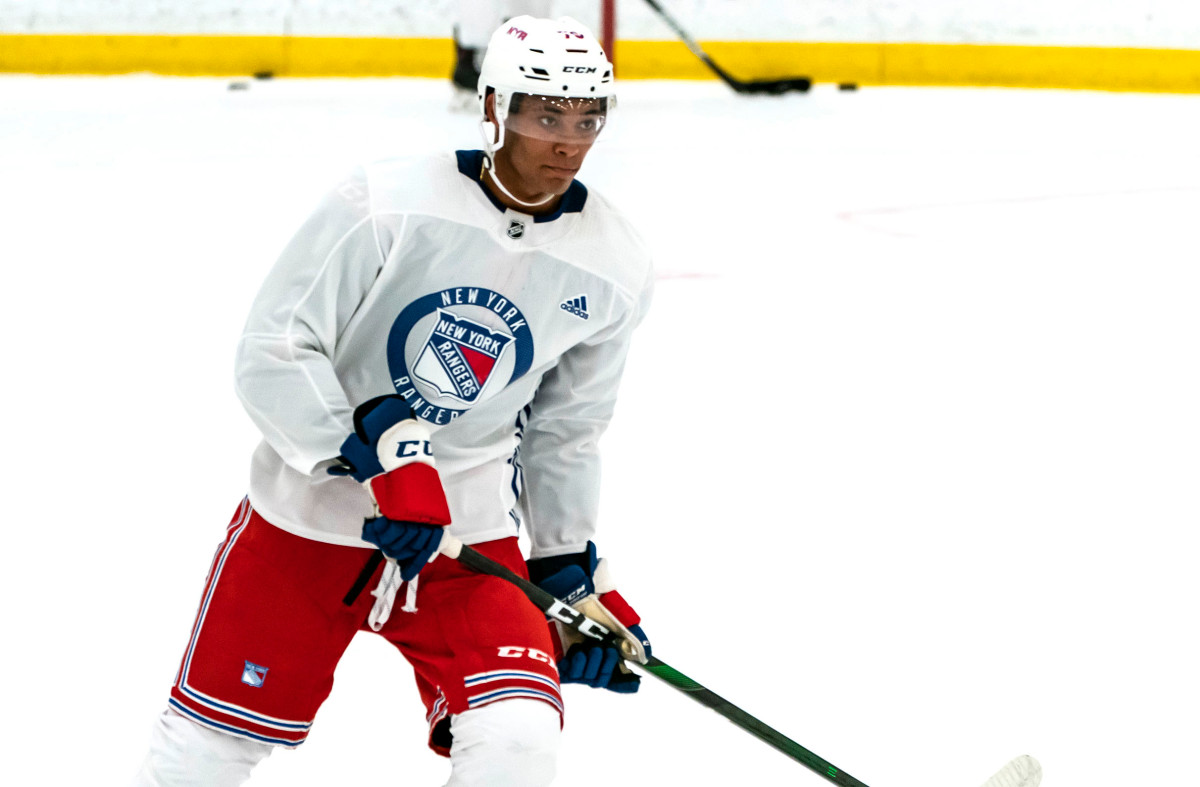 K’Andre Miller has thrived, but won't play for Rangers this year