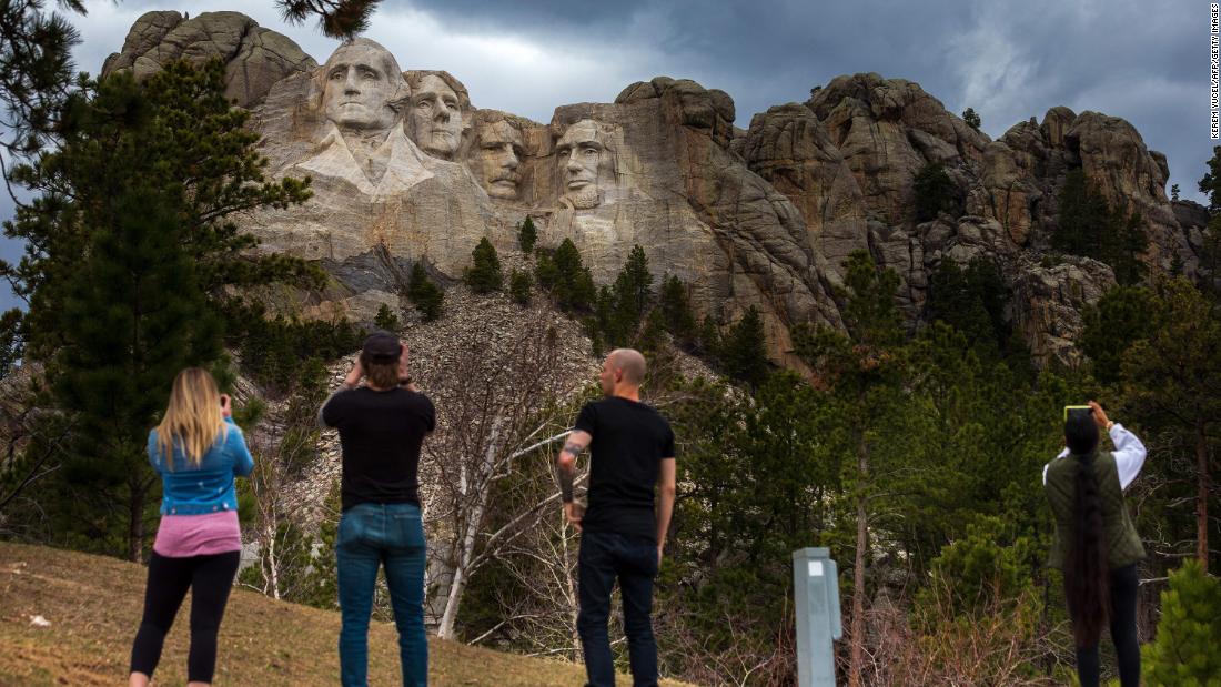 Tourists at Mount Rushmore National Memorial on April 23, 2020 in Keystone, South Dakota.