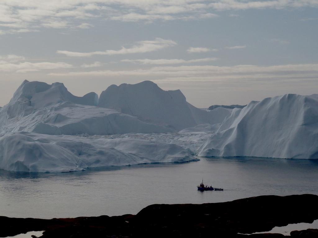 'Canary in the coal mine': Greenland ice has shrunk beyond return, study finds