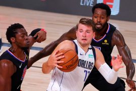 Doncic makes history but Mavericks fall to Clippers after Porzingis ejection