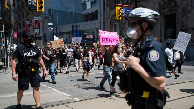 Tory tables 'sweeping' reforms to Toronto police, including budget reallocation
