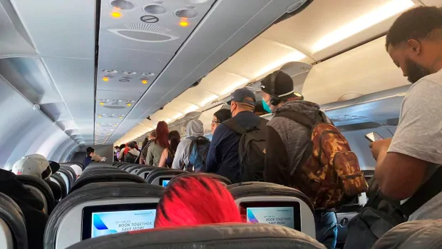 Dozens of airline passengers in Canada hit with fines, warning letters for refusing to wear a mask