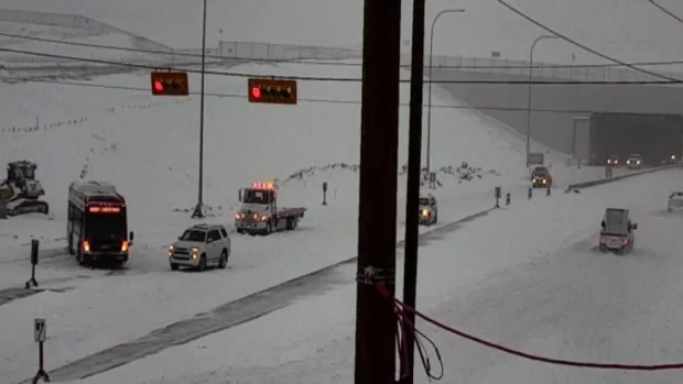 Calgary roads clogged with snow after storm dumps as much as 40 cm on city