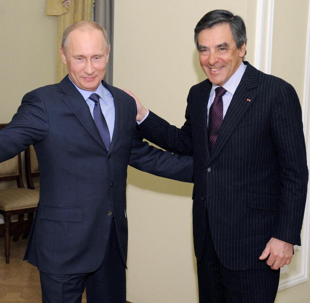Russian President Vladimir Putin (left) with former French Prime Minister François Fillon in 2013