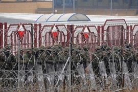 Conflict - Belarus border guards clear migrant camps