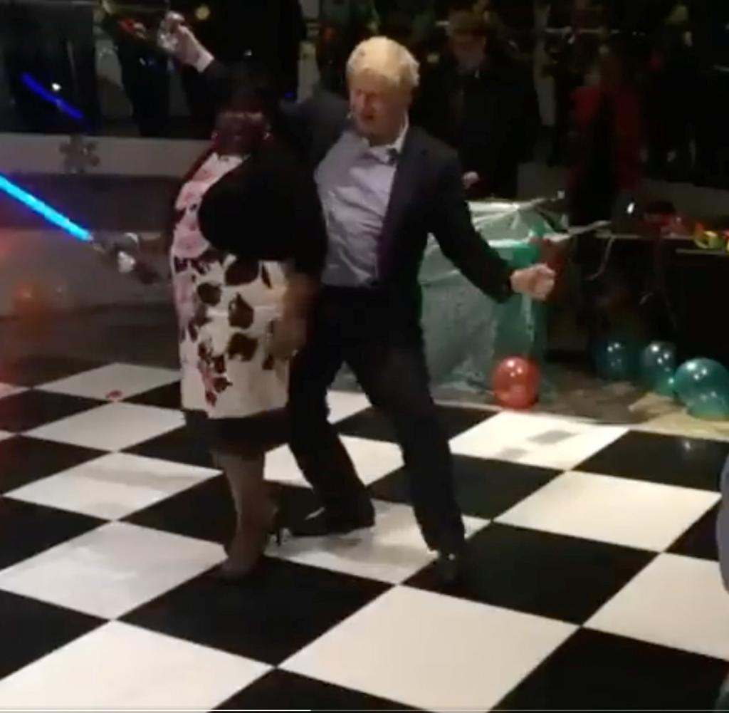 Scene from the video: Johnson dancing