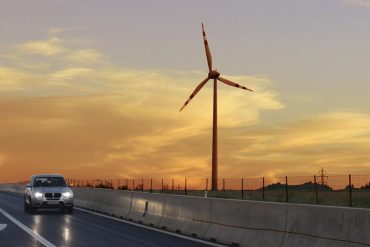 How many times does the wind turbine have to be turned for an electric car