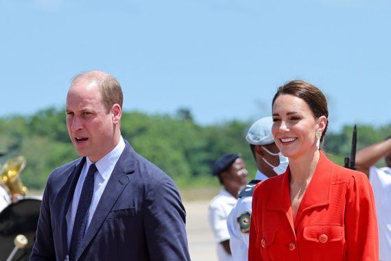 sweet moment!  Prince William holds Kate's hand
