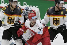 Germany's ice hockey team enters quarter-finals after third win