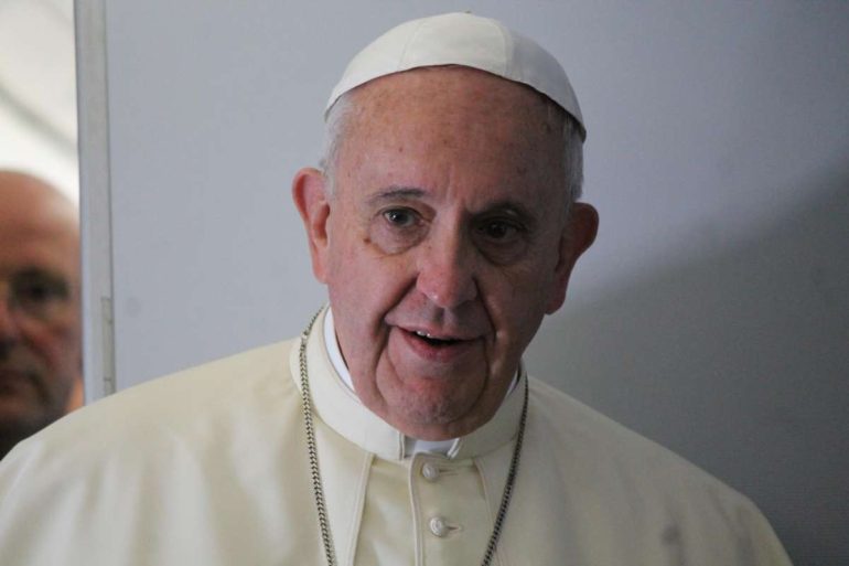 Pope Francis speaks on a plane to Canada on World Grandparents Day