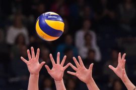 Volleyball players save their chance for the final round