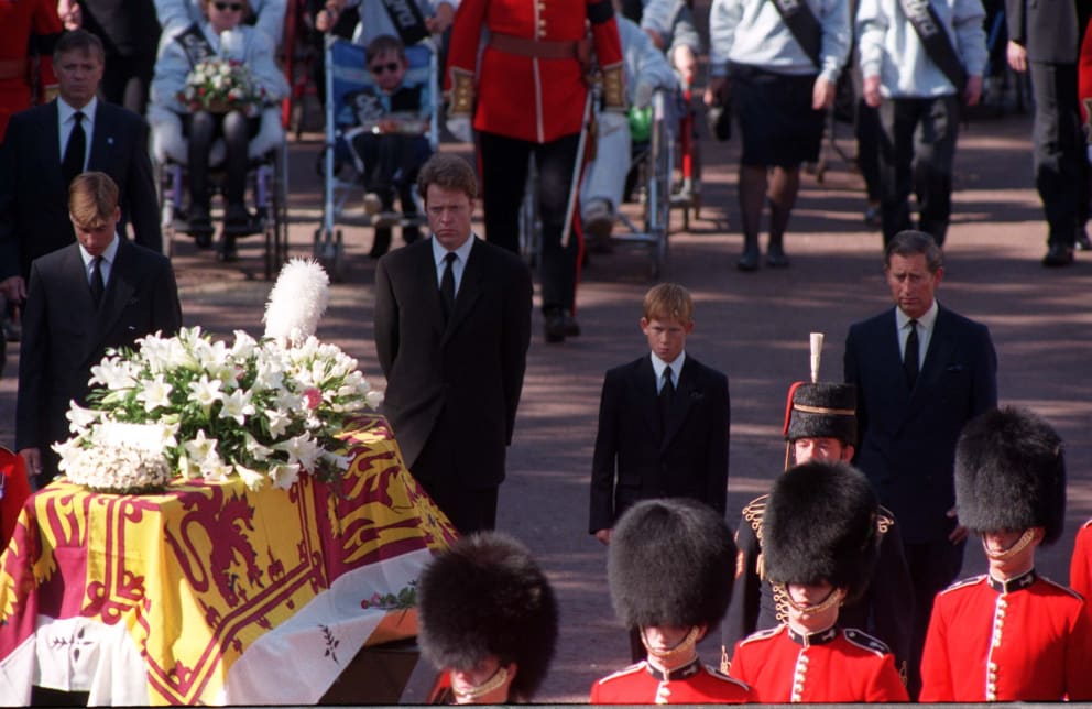 September 6, 1997: William (left) and Harry (second from right) with father Charles (right) and Diana's brother Charles Spencer in the coffin of their mother Diana