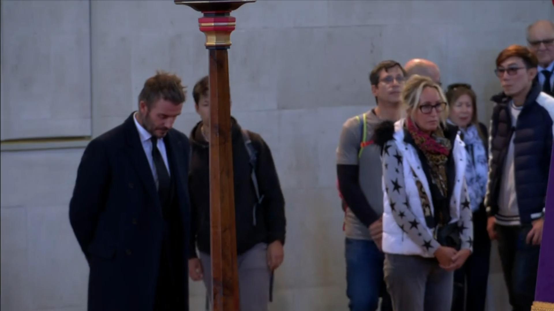David Beckham bows to the coffin of the Queen he has been looking at it for 14 hours