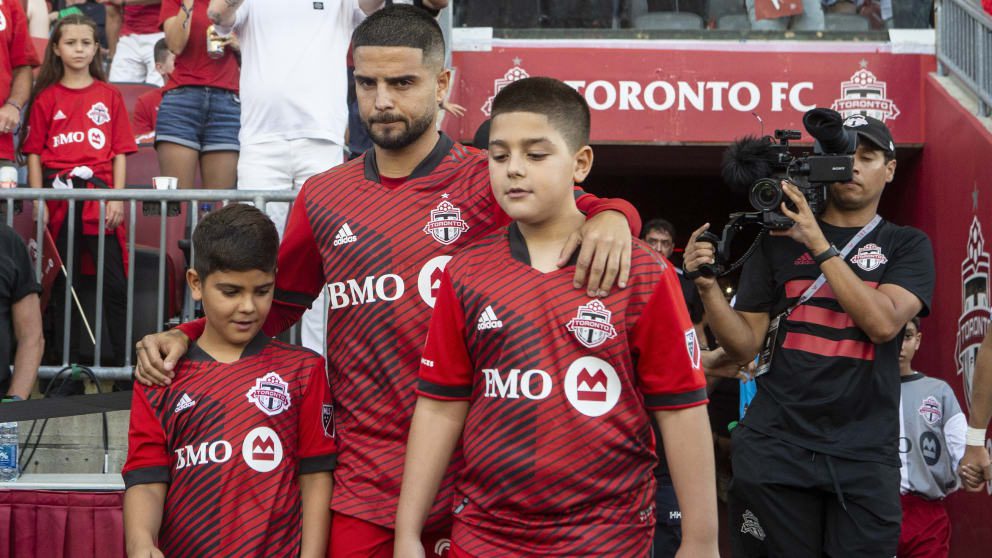 Lorenzo Insigne with his sons Christian (left) and Carmine at his new club Toronto FC.  in a game for