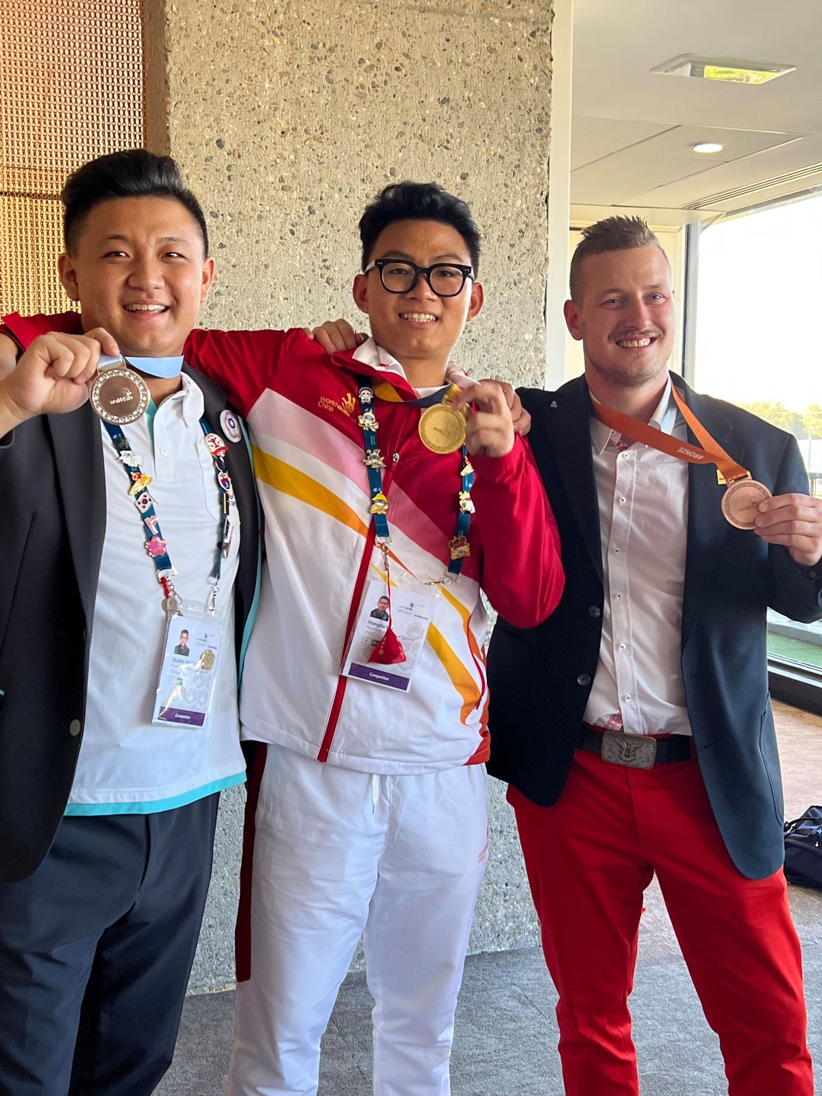 The top three (from left) in the Plasterer/Drywall Contractors category at the World Skills Special Edition in Bordeaux: Guan-Yu Chen (Taipei, Silver), Hongda Ma (China/Gold) and the bronze medalist Butler from Grund near Gstaad, Adrian.