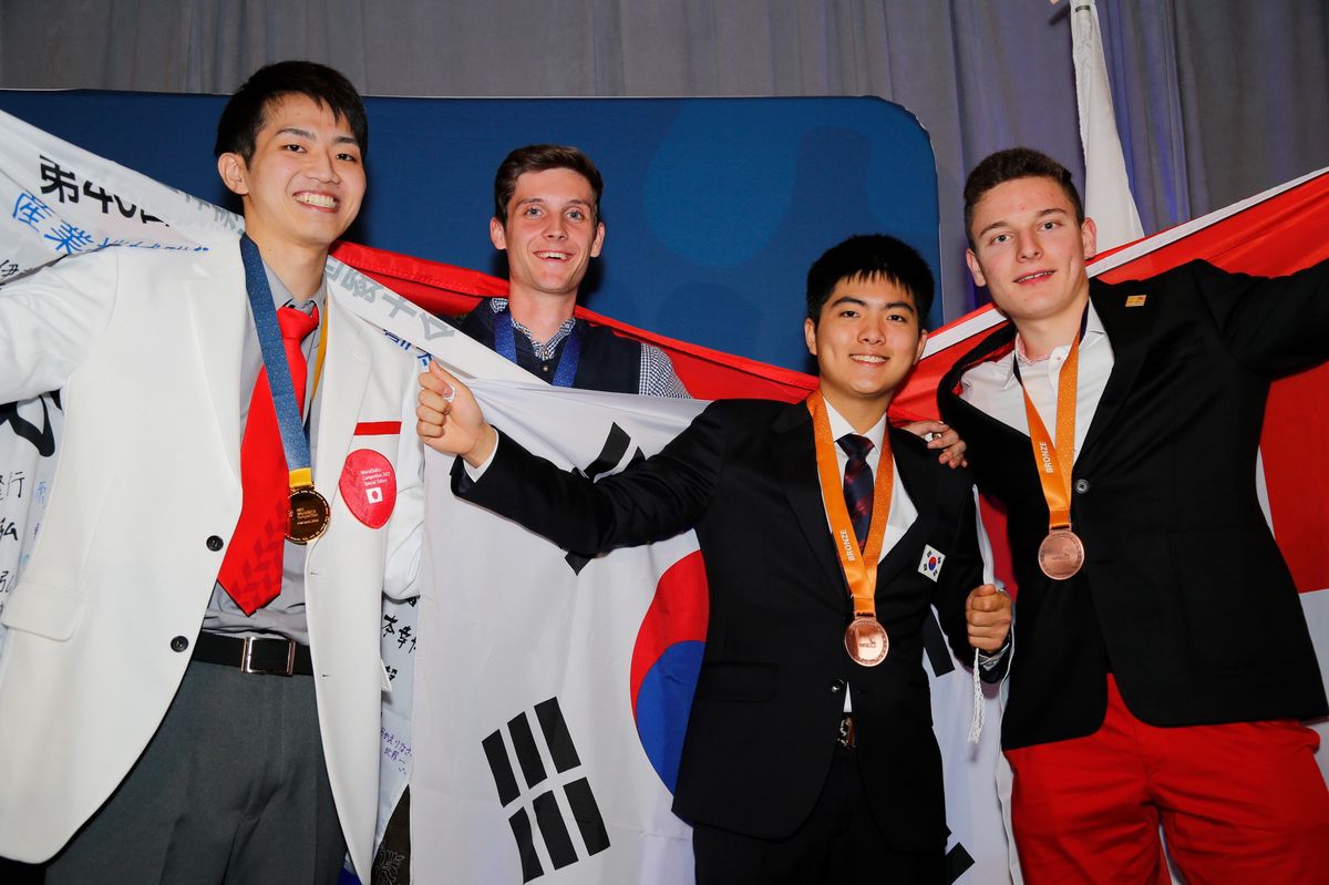The medalists from Polymechanics' Decentralized World of Skills in Brampton (Canada) are (from left): Sota Morimoto (Japan/Gold), Lukas Schwarzler (Austria/Silver) and two bronze winners Hyunsu Lee (Korea) and Gil Butler from Linden.