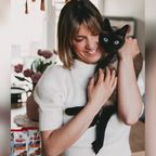Isabelle Horn with the family cat Mia.