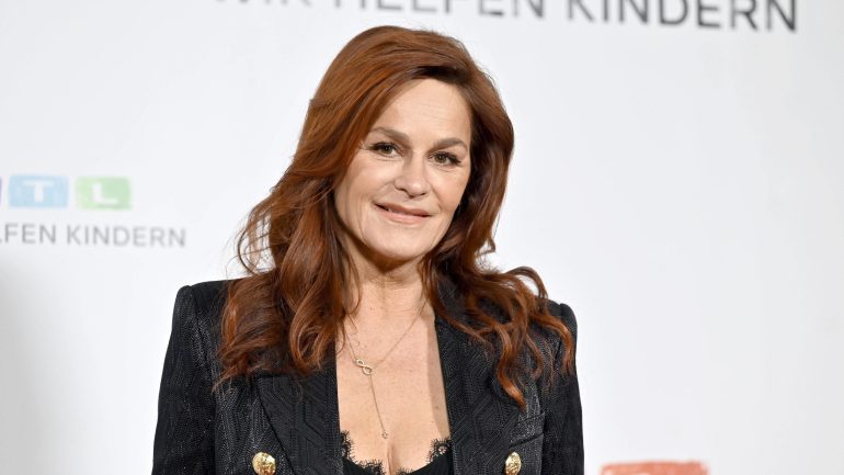 what a body!  Andrea Berg wows fans in short glitter dress